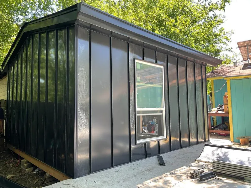 Black standing seam metal wall panels for Roof Inspection in Lehi